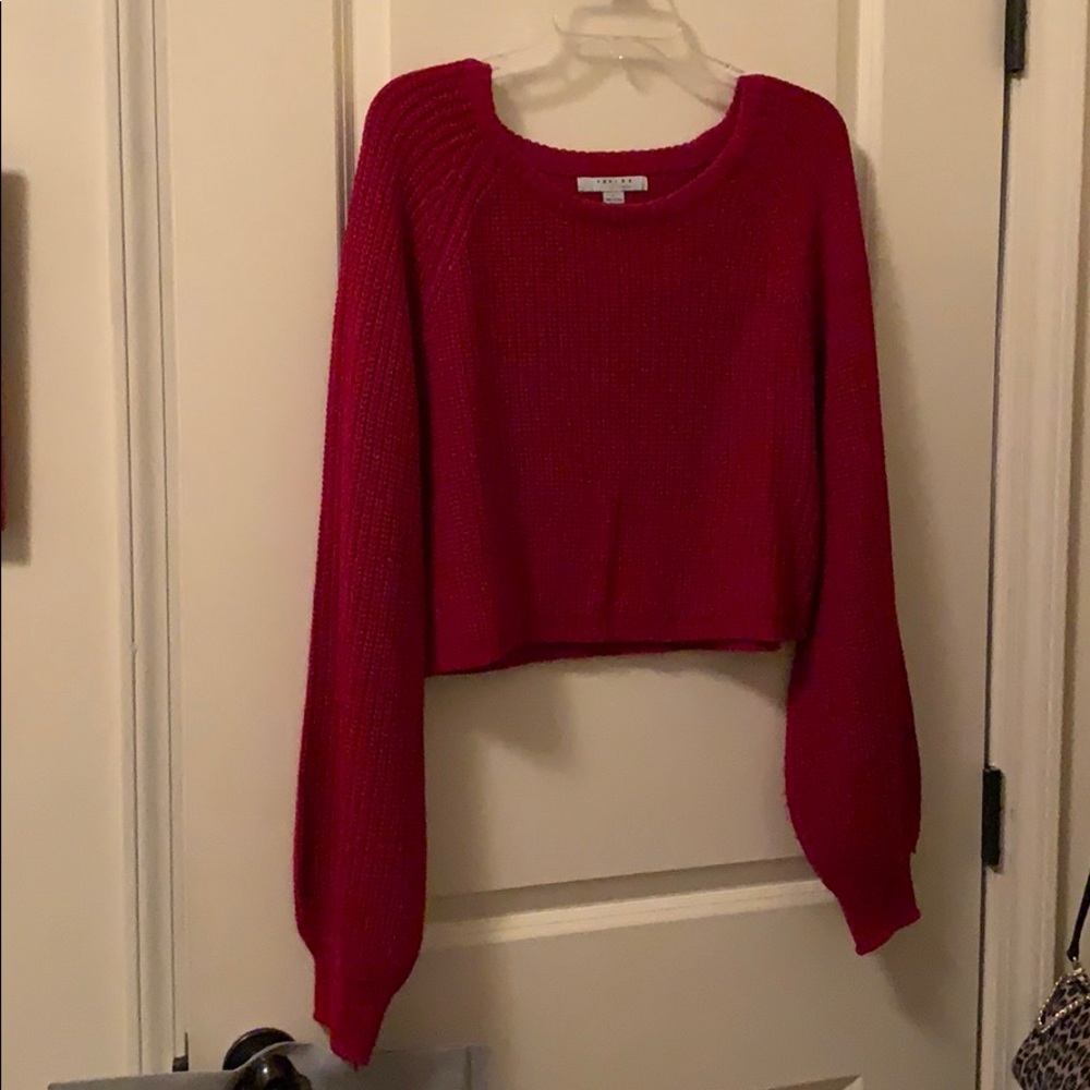 Red sweater! Size L from these three boutique
